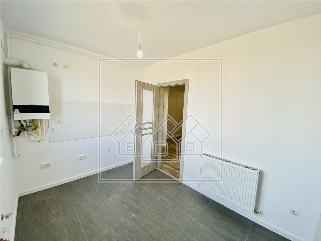 Apartament de vanzare in Sibiu - 3 camere, 2 bai si balcon -