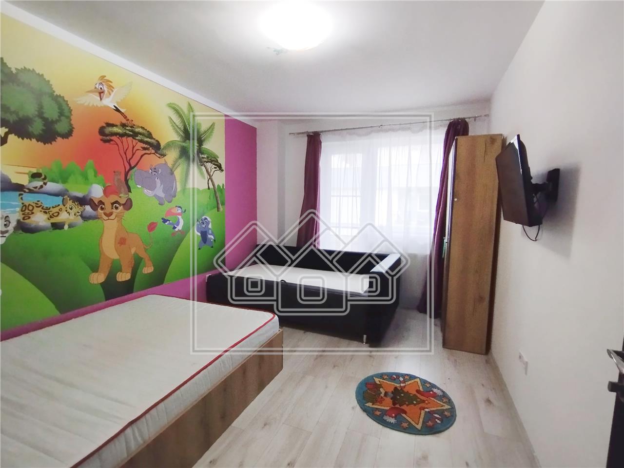 Apartament de vanzare in Sibiu - 3 camere, 2 bai, garaj subteran