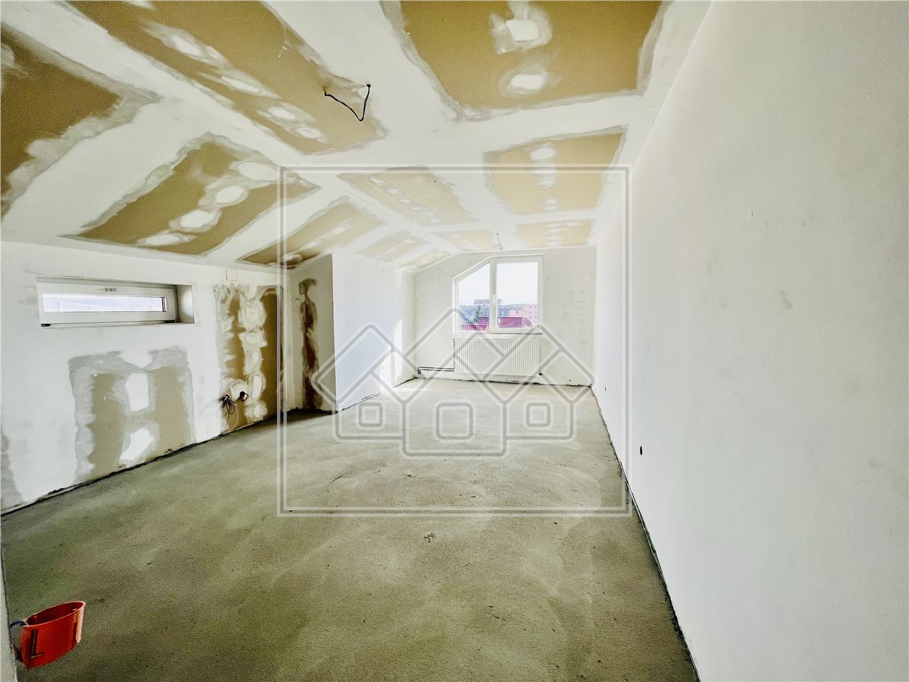 Apartament 5 camere de vanzare in Sibiu -  pod amenajat