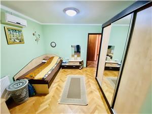 Apartament de vanzare in Sibiu - 3 camere, 2 balcoane si pivnita -