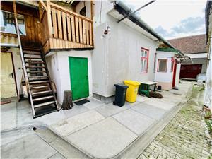 Casa de vanzare in Sibiu - 72 mp utili - curte comuna - Cisnadiei